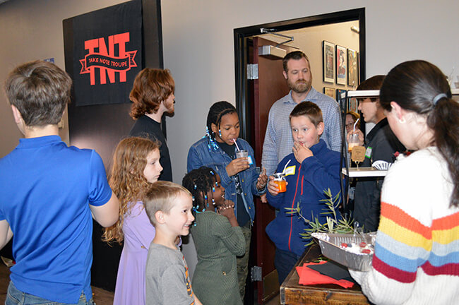 TNT_Guests_At_Open_House_Enjoy_Refreshments