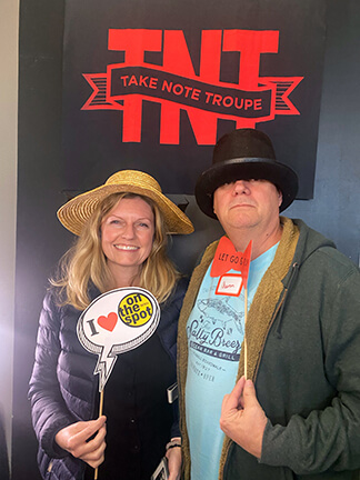 TNT_Supporters_Beth_and-Aaron_Armstrong_Pose_In_Photo_Booth_At_Open_House
